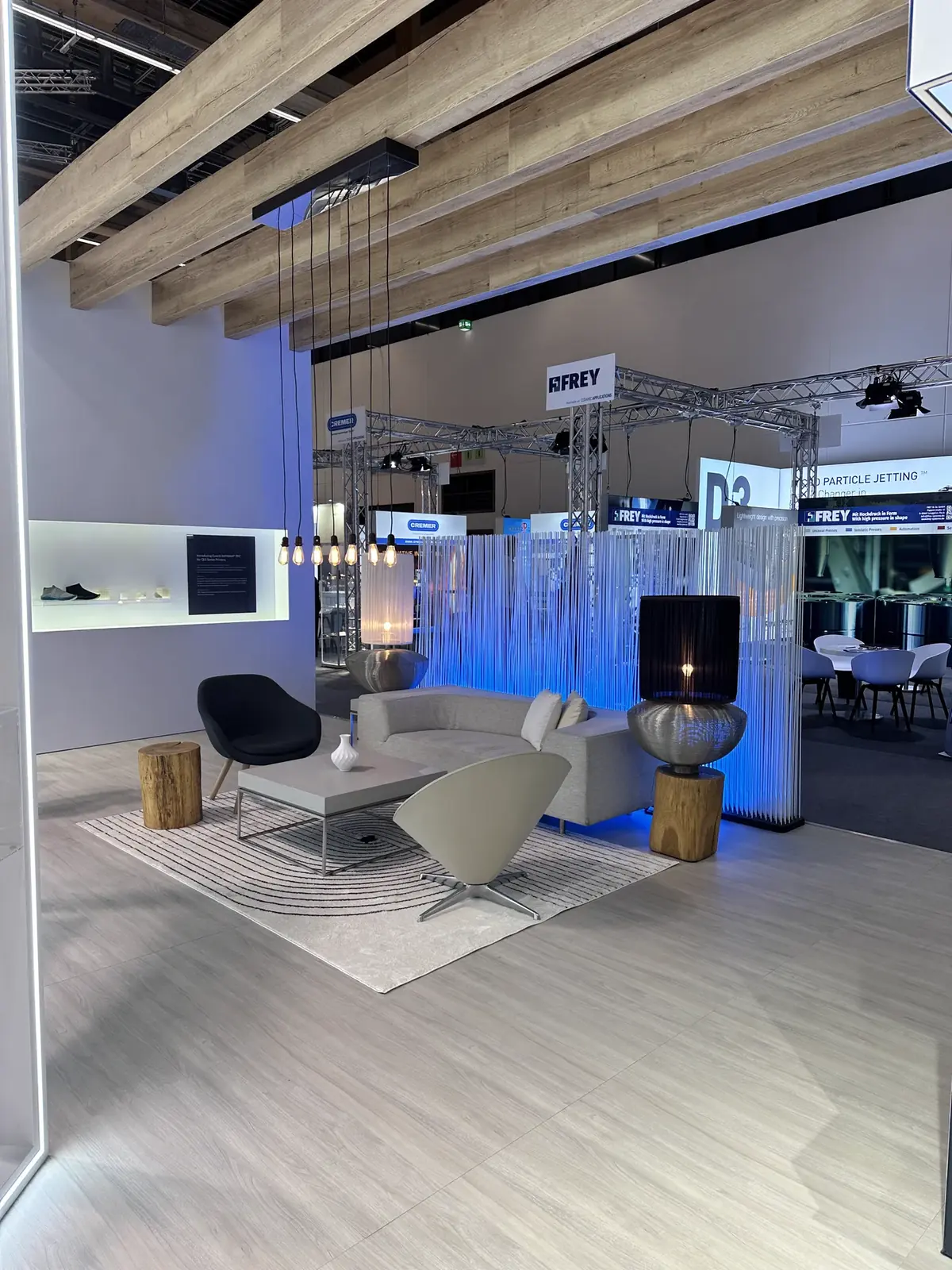 Hospitality lounge inside the Nexa3D exhibition stand at Formnext 2023 in Frankfurt