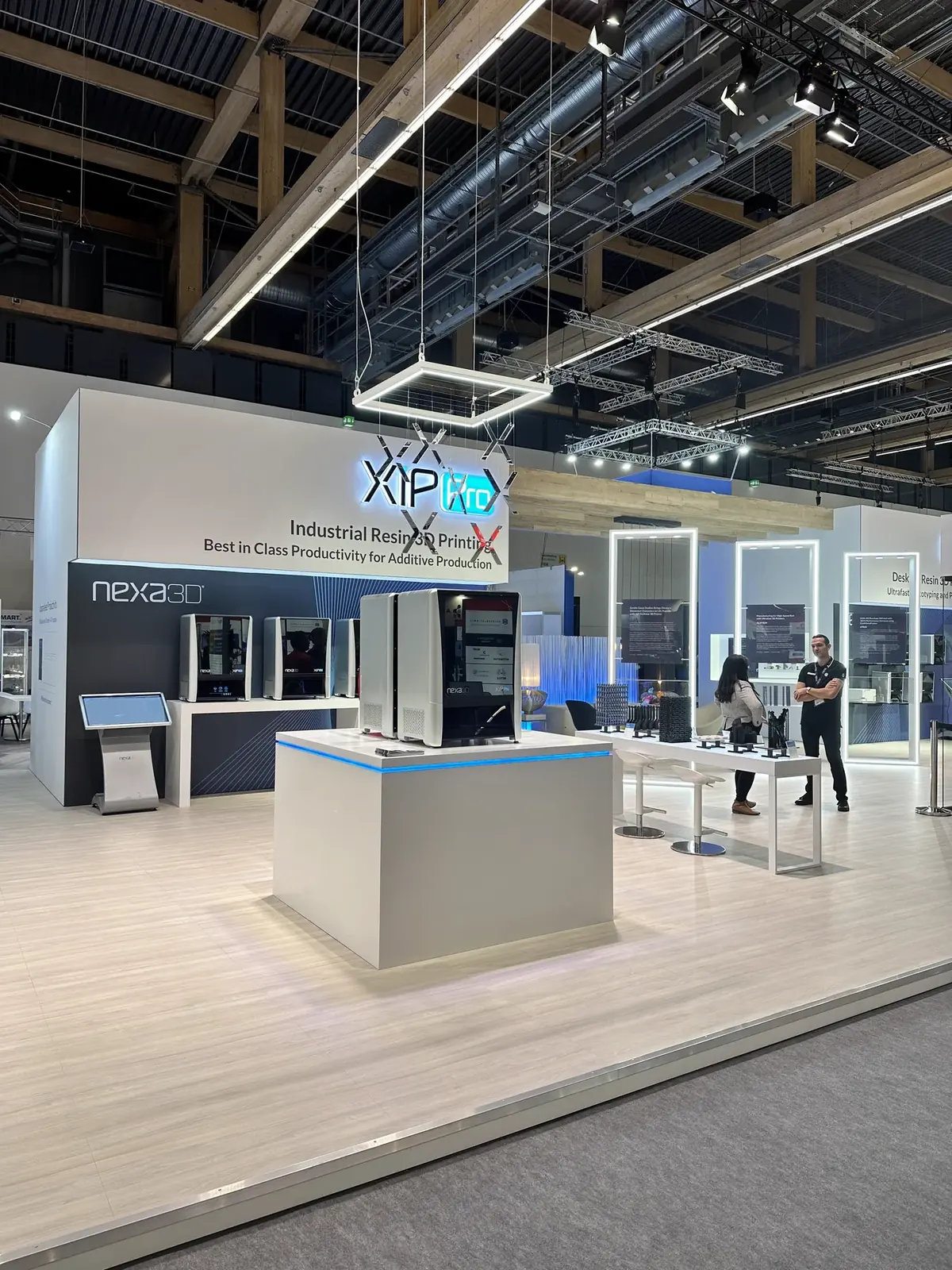 Nexa3D exhibition stand at Formnext 2023 in Frankfurt, featuring the XiP Pro industrial resin printer